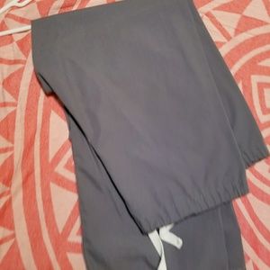 Grey scrubs.  2 pants and top.
